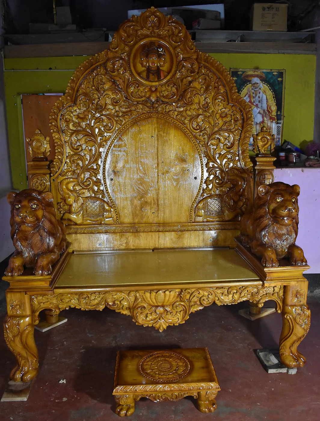 Deity throne in solid timber, carved with makara brackets and beaded borders