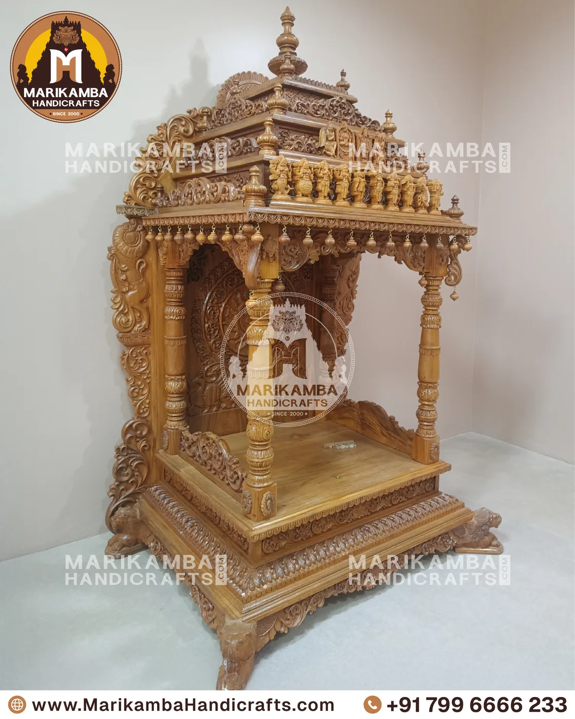 Carved teak pooja mandira finished in a warm natural sheen, ready for installation — piece 80 of the collection