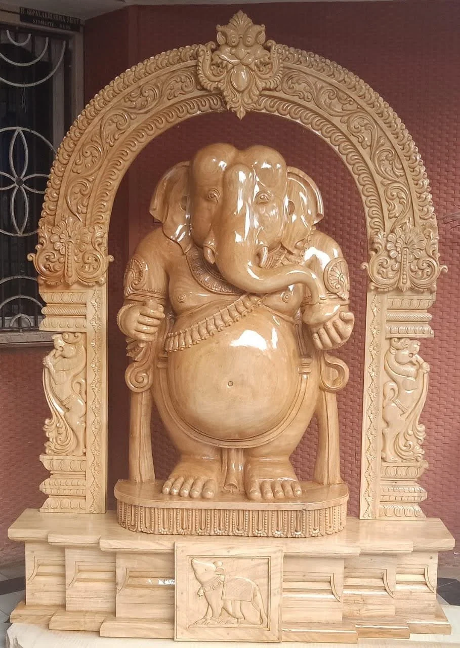 Carved figure sculpture in solid timber, finished by hand — piece 11 of the collection