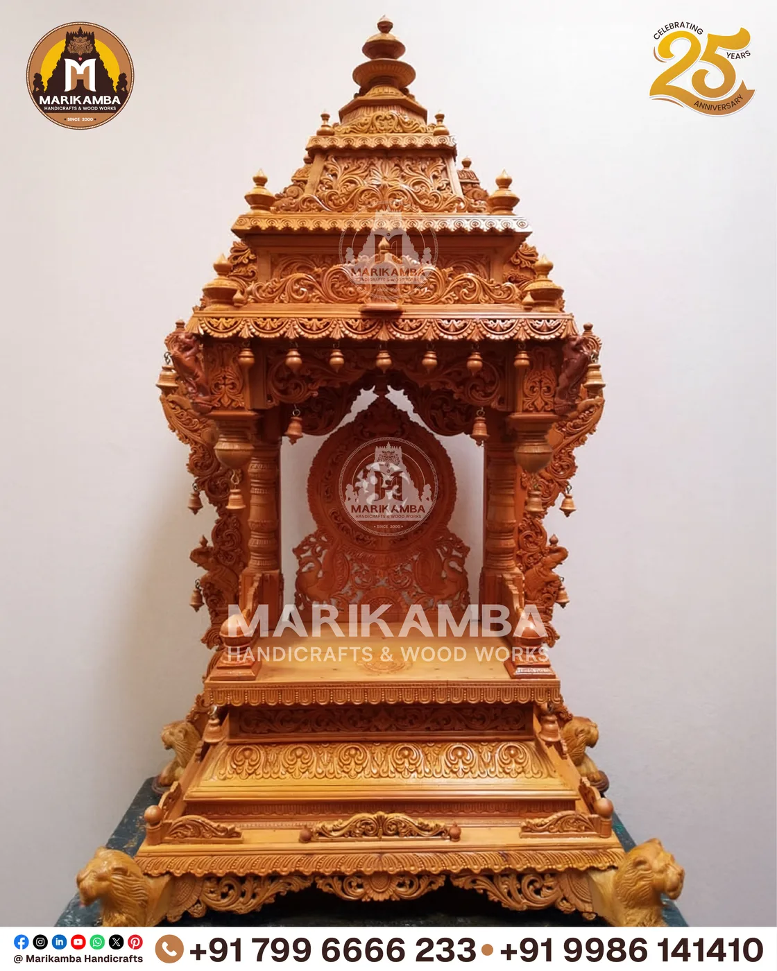 Compact wooden pooja unit with carved doors, drawers and a bell-motif valance — piece 26 of the collection