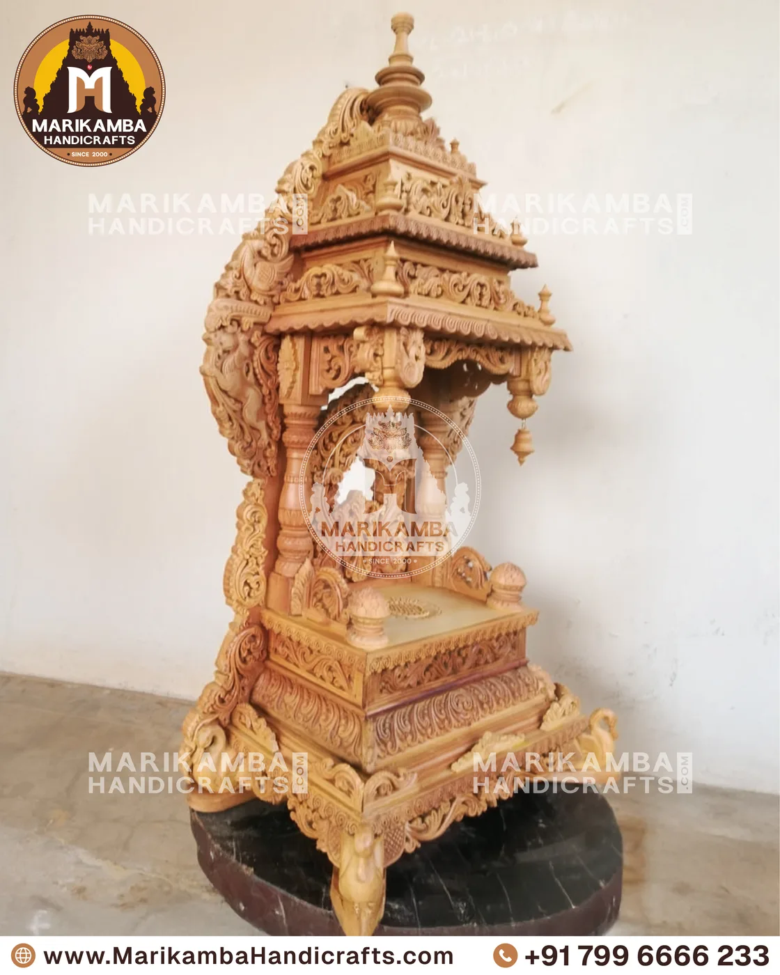Detail of a pooja mandira arch, showing hand-carved creeper and leaf motifs — piece 88 of the collection