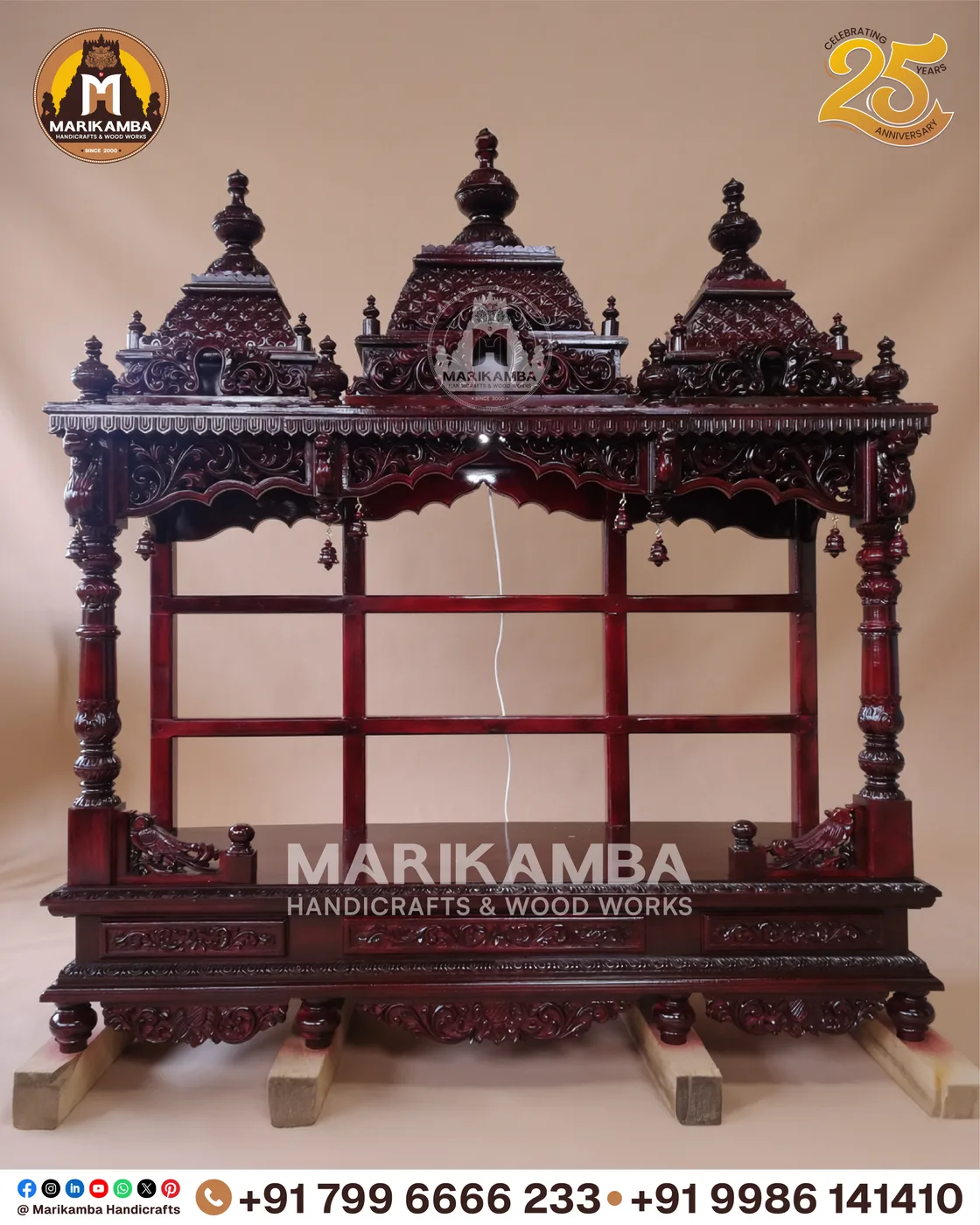 Carved pooja mantapa with layered temple-tower roof and floral panelling