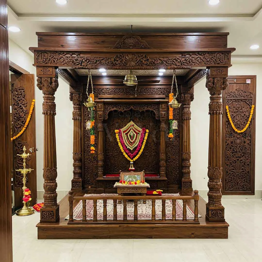 Wooden mandir design reference showing carved pillars, arch and base storage (reference 14)