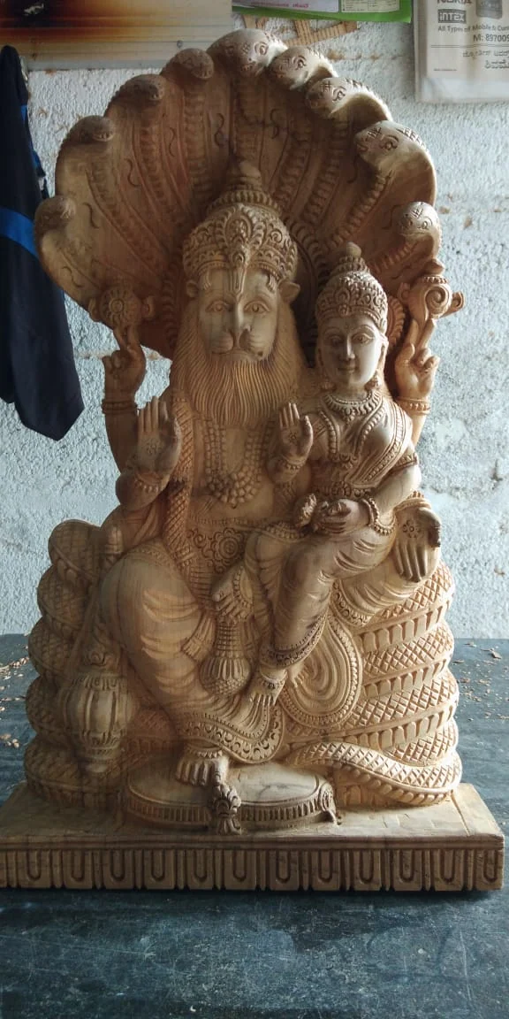 Hand-carved wooden sculpture from the Marikamba atelier in Sirsi, Karnataka — piece 09 of the collection