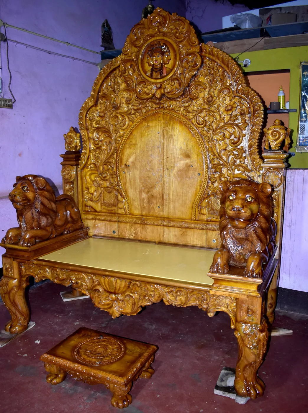 Carved simhasana with tiered crown, pillars and floral relief panels — piece 07 of the collection