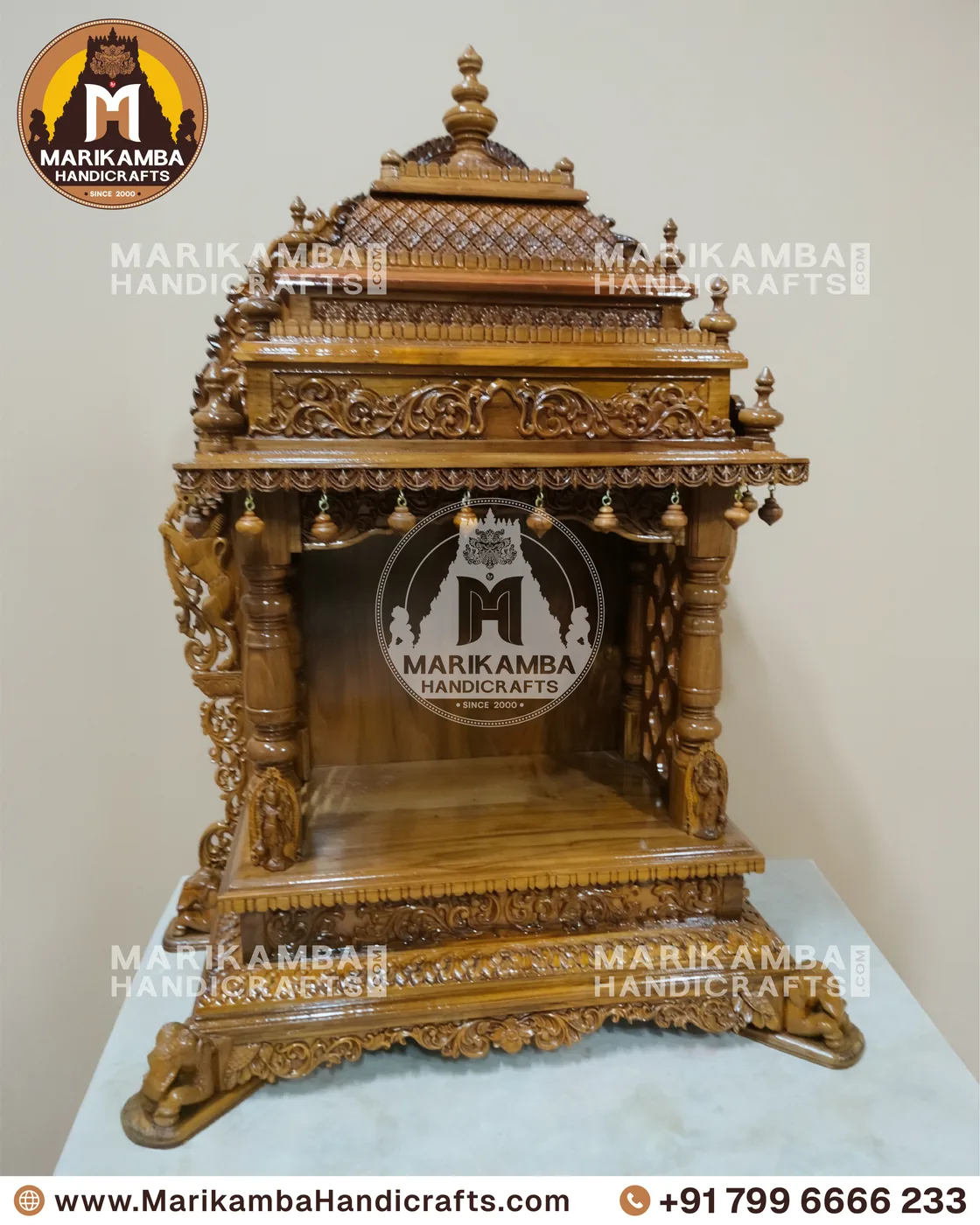 Carved pooja mantapa with layered temple-tower roof and floral panelling — piece 73 of the collection