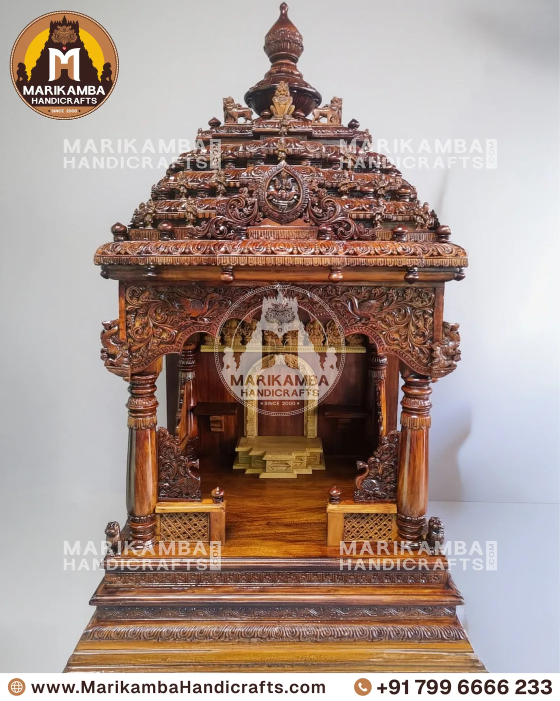 Compact wooden pooja unit with carved doors, drawers and a bell-motif valance — piece 106 of the collection