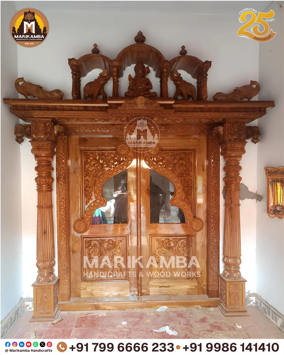Double-leaf carved door with deity relief panels and brass-fitted joinery — piece 24 of the collection