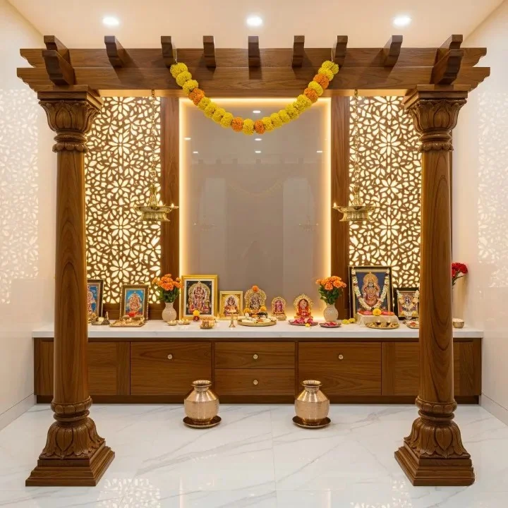 Carved back wall panel with lotus and creeper motifs behind the deity platform