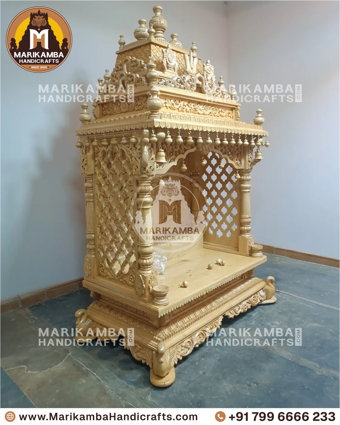 Carved pooja mantapa with layered temple-tower roof and floral panelling — piece 123 of the collection