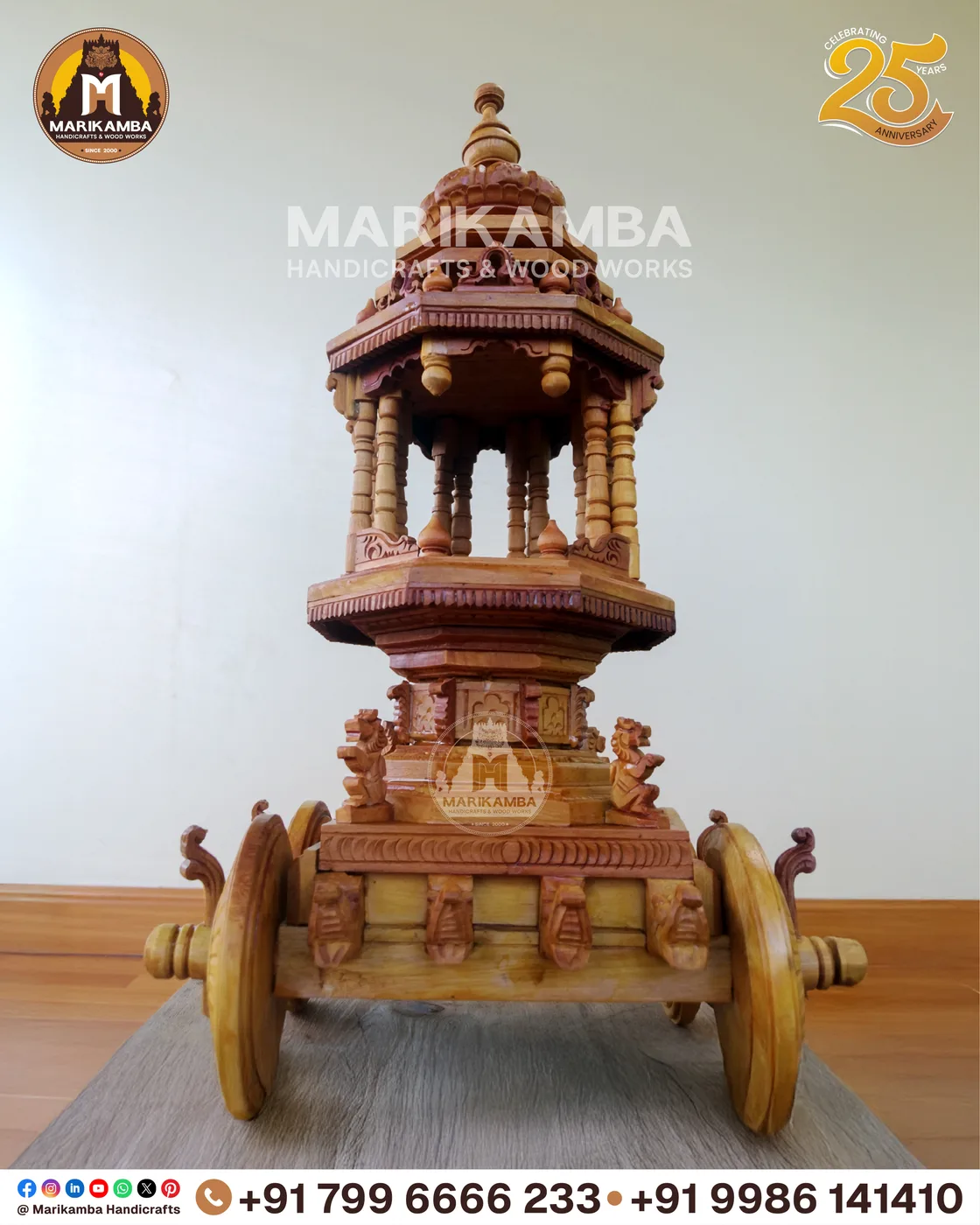 Hand-carved festival rath with deity niches, guardian figures and carved wheels