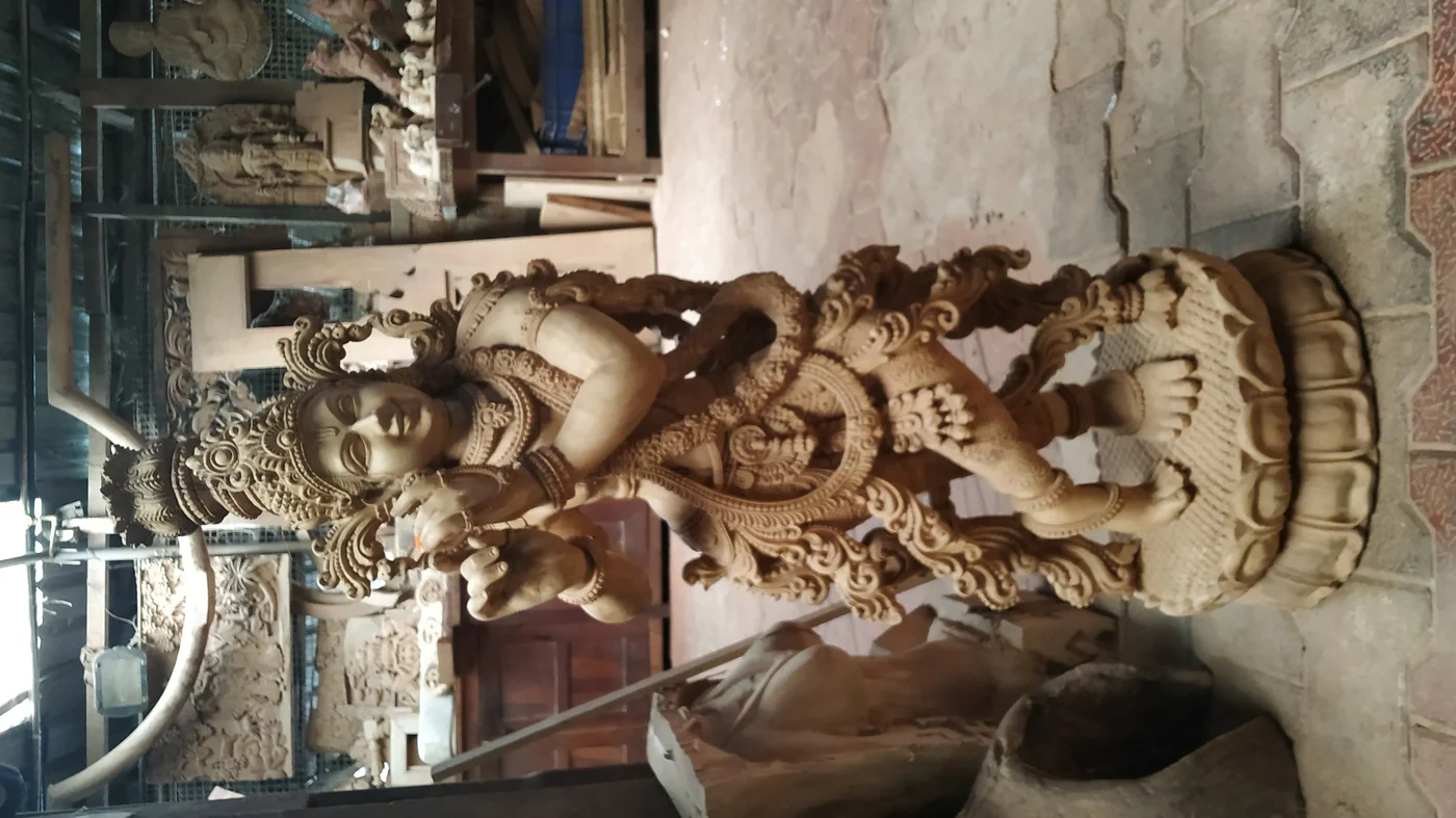 Relief sculpture panel carved in teakwood — piece 13 of the collection