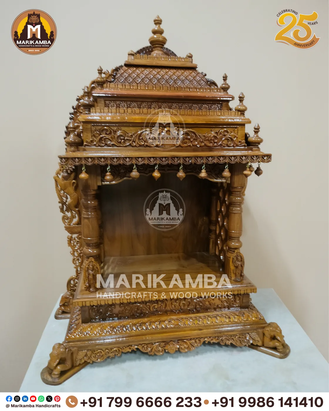 Compact wooden pooja unit with carved doors, drawers and a bell-motif valance — piece 46 of the collection