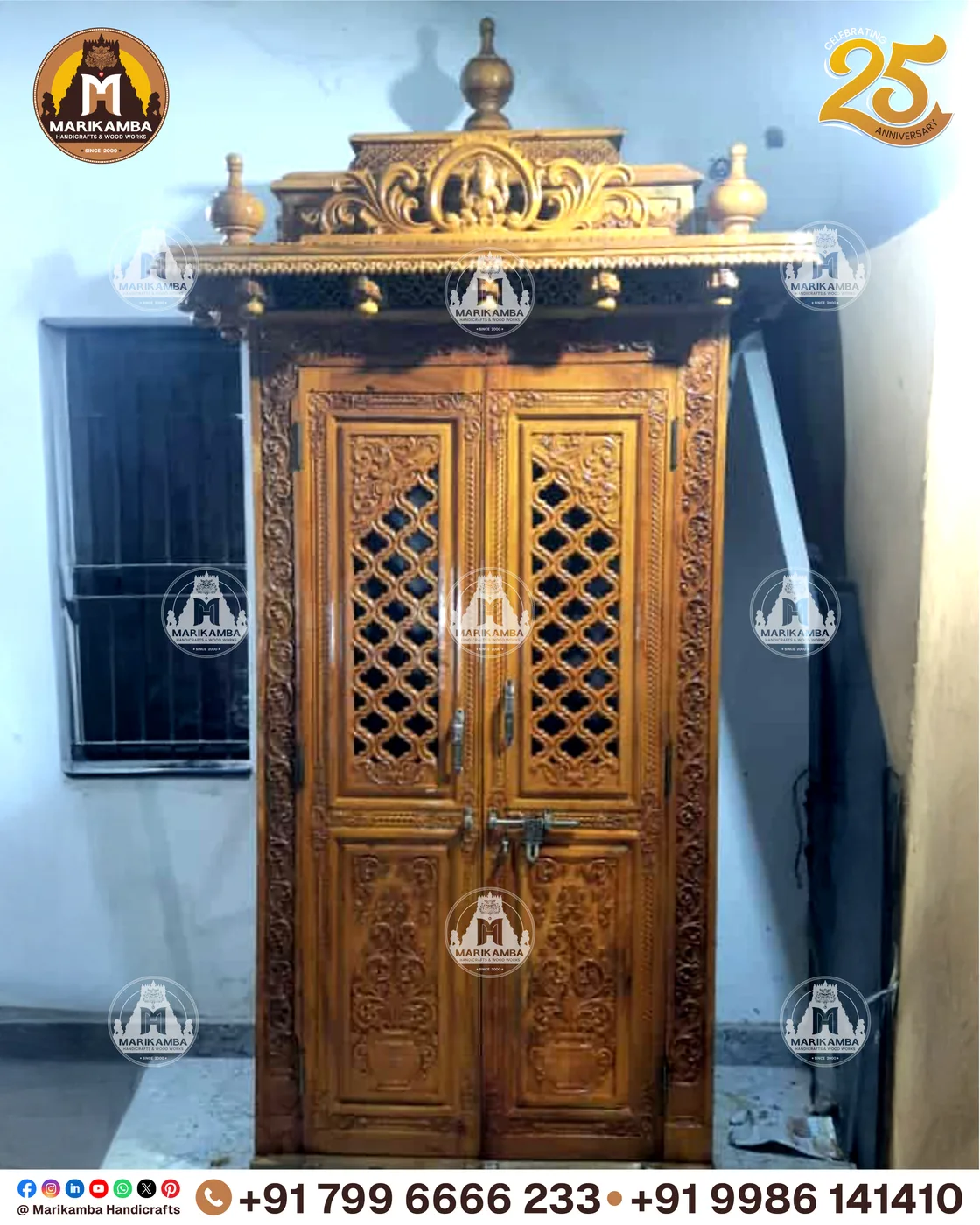 Double-leaf carved door with deity relief panels and brass-fitted joinery — piece 44 of the collection
