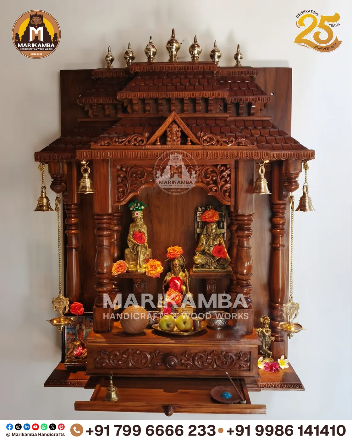 Compact wooden pooja unit with carved doors, drawers and a bell-motif valance — piece 36 of the collection