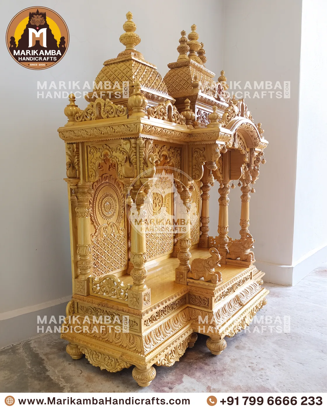 Carved teak pooja mandira finished in a warm natural sheen, ready for installation — piece 90 of the collection